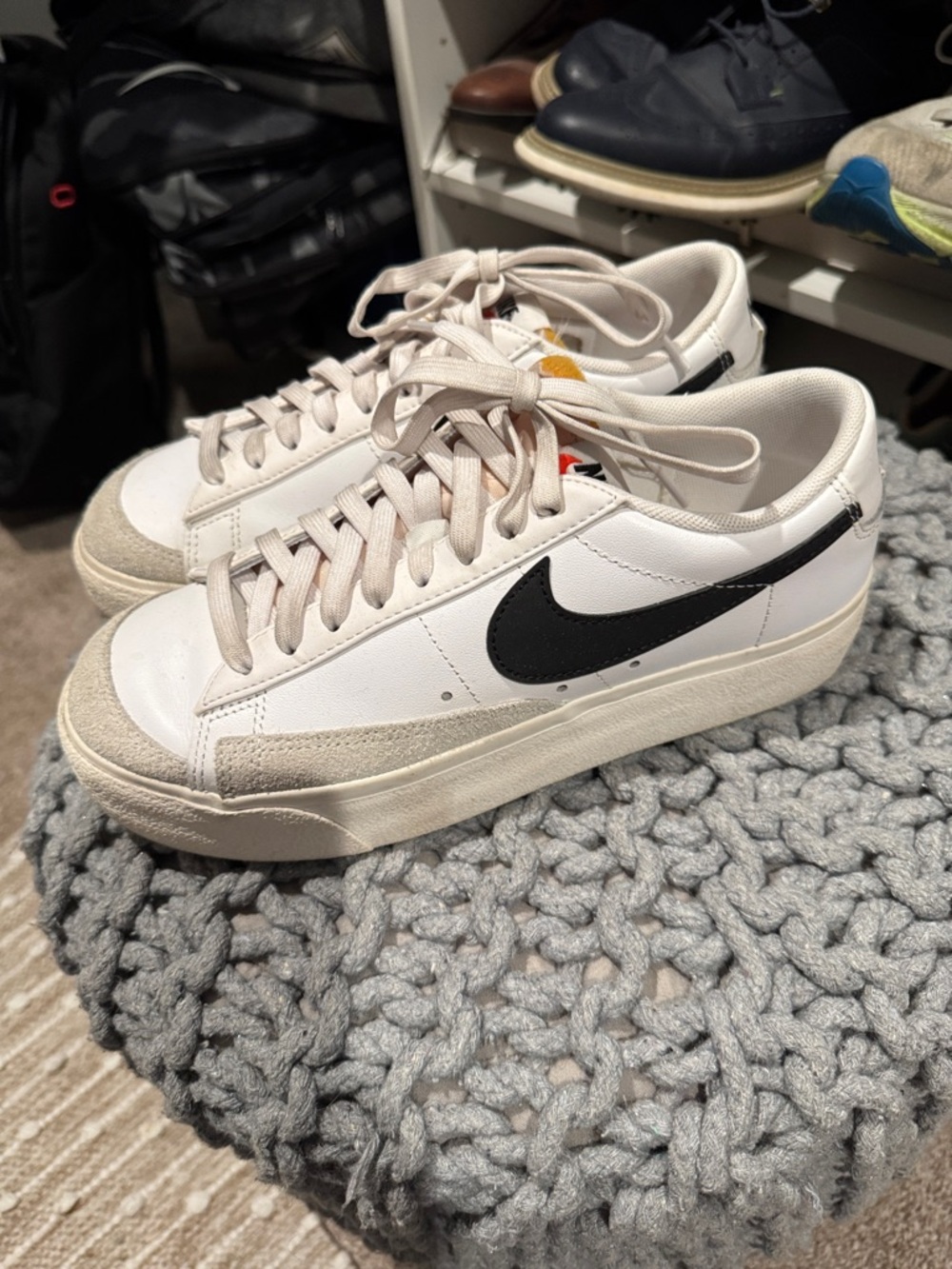 Nike White Low-Top Sneakers with Black Swoosh
